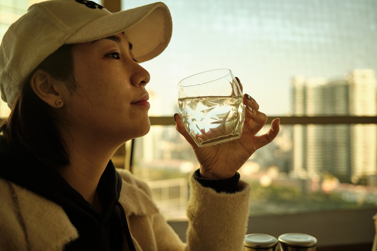 A woman with a glass of water