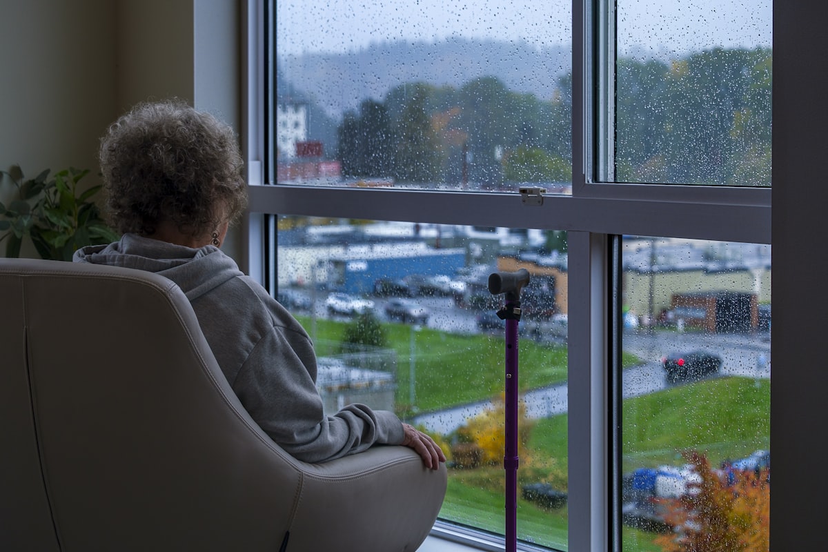 A woman looking out a window